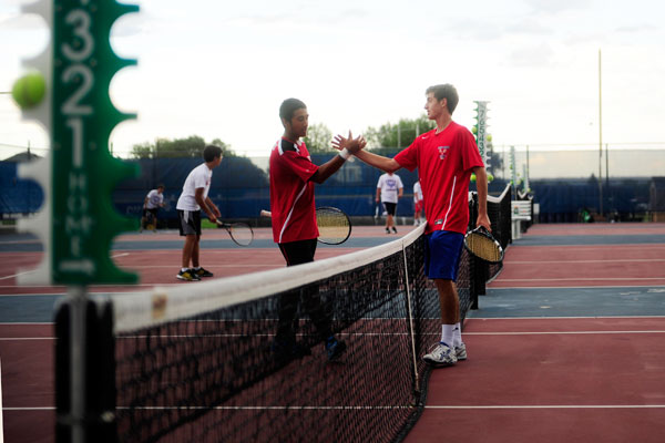 Cherry Creek and Kent Denver shake hands before the match.