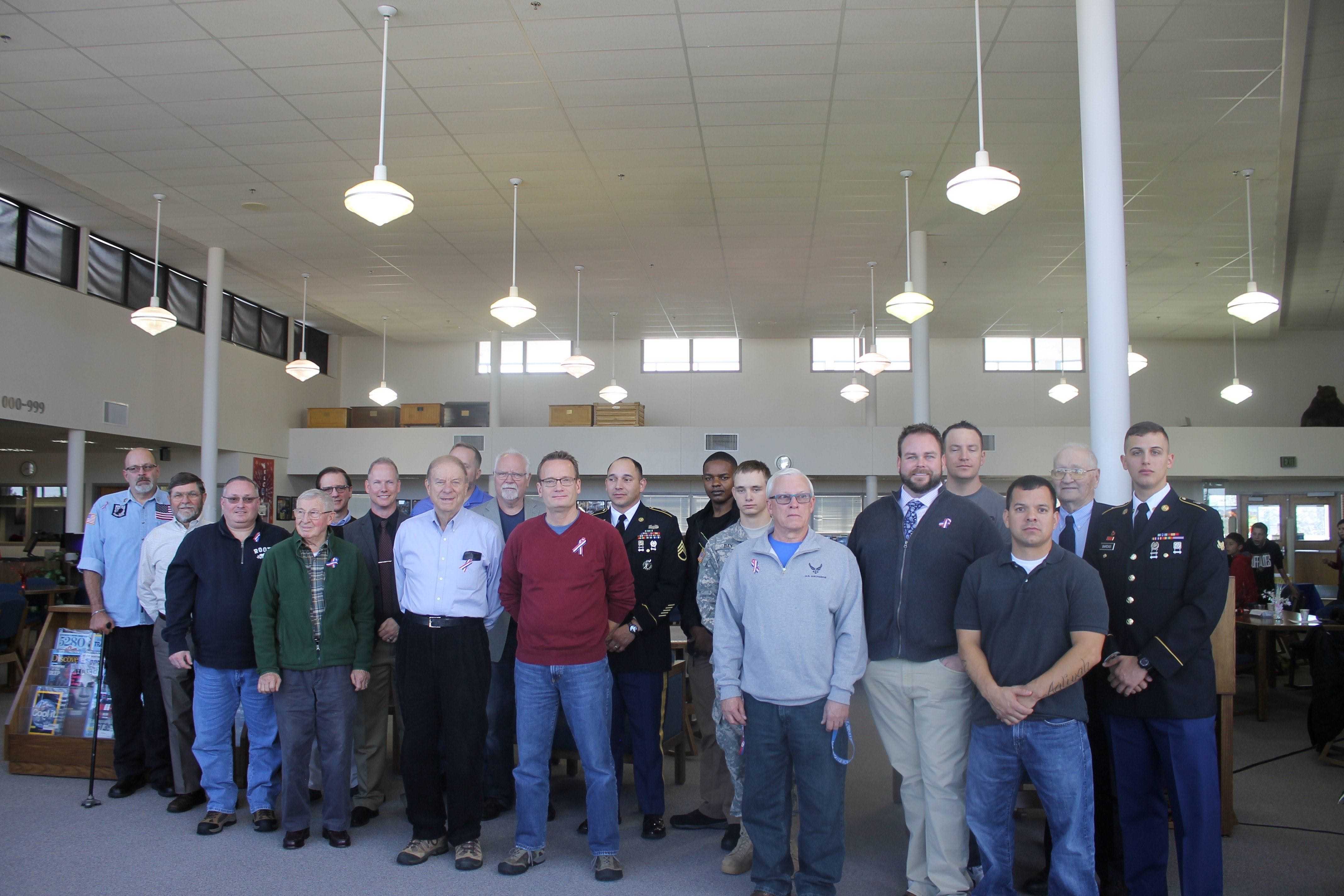 All the veterans that attended the event gather to take a group photo at the end.