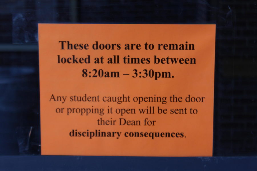 This sign is posted on various doors outside IC, Fine Arts, and West.