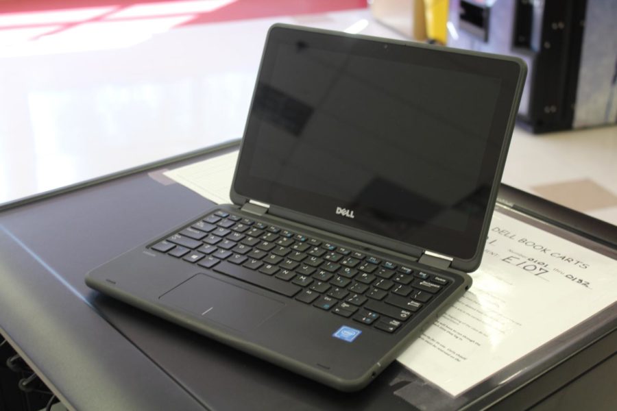 The new Dell computers function both as laptops and tablets.