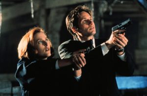Gillian Anderson (left) and David Duchovny star in The X-Files (1993-2018) as special agents Dana Scully and Fox Mulder.
