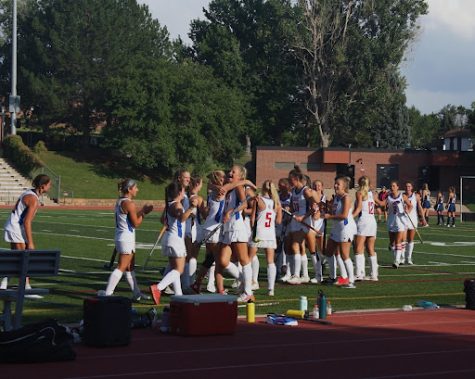 Cherry Creeks varsity Field Hockey team celebrates after scoring their first goal on 8/25 the first home game of the season against Palmer Ridge. They finished the game 1-1, the first tie of the season. 