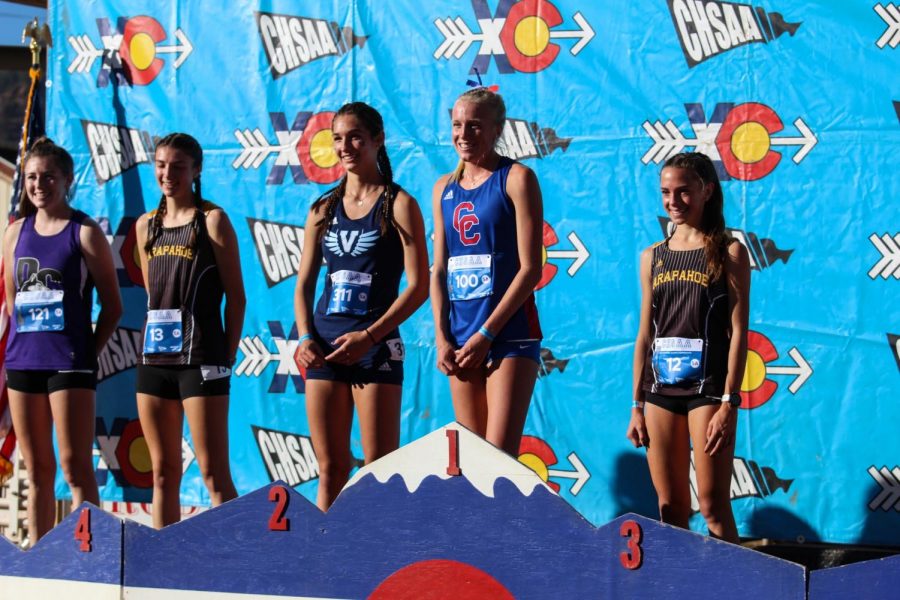 Senior Riley Stewart wins her third state title with a time of 17:20, 12 seconds faster than her time last year. Stewart signs to continue her running career at Stanford University on Nov. 10. Im excited for the future, Stewart said.