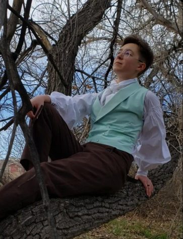 Senior Stefven Klein sits in a tree with his freshly finished, historically accurate, handmade outfit. Klein has been sewing since he was five years old and started making his own clothes only a few years ago. “[Sewing] helps you kind of slow down your mind and focus on whats happening in the moment,” he said. “You realize that if youre putting stress into what youre doing, youre going to mess up, and you need to take that step back to calm yourself down.”