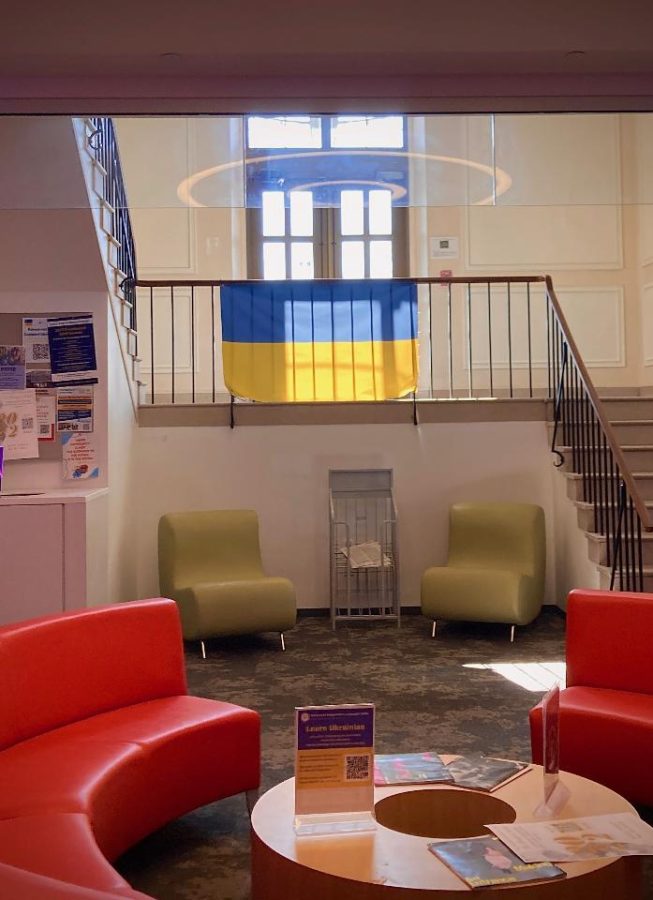 A+Ukrainian+flag+hangs+in+a+world+language+student+center+at+Connecticut+College+in+New+London%2C+Connecticut%2C+on+March+14.+The+college+offered+a+program+to+learn+Ukrainian+on+the+table+in+the+foreground.+Since+the+war+began%2C+much+of+the+world+has+erupted+in+support+for+Ukraine.