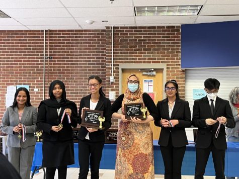 The debate qualifiers for original oratory accept their awards after the two day debate national qualifying tournament. “It was truly exhilarating and very surreal,” sophomore Akshita Bisoyi said. 