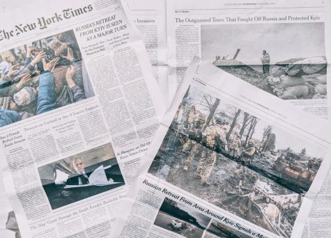 Newspaper clippings show how the Russia-Ukraine conflict has progressed since the first invasion in late Feb.