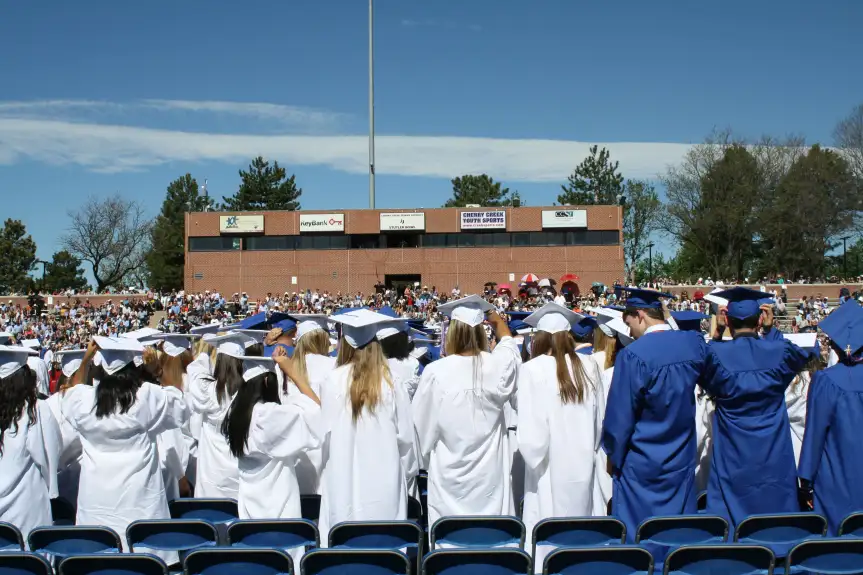 Cherry Creek High School graduates celebrate in the graduation ceremony in Stutler Bowl