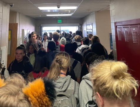 Student crowding in hallways such as this one in West Building means tardies are unavoidable. (Blayne Aina)