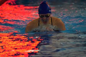 Senior varsity swimmer Micaela Brown competes against Cherokee Trail during the 200 yard IM event, placing sixth in her heat. The girls Swim and Dive team competed with Cherokee Trail on Jan. 26, just two weeks before winning the State Championship on Feb. 10.