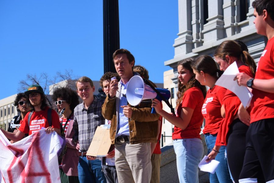 NEW REGULATIONS: Denver mayoral candidate Mike Johnston speaks during a protest about gun violence on April 29. Johnston spoke about recent gun-control legislation signed into law by praising its historic standing. “I think they are historic successes that have been led by historic organizing efforts by moms and students who came out and demanded action,” Johnston said. “They delivered the most significant package reform in 10 years. That’s a huge accomplishment for the state.”