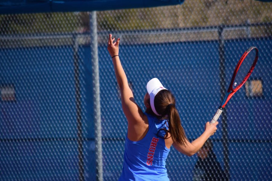 Senior girls varsity 1 tennis player Lorena Cedeno plays during a match against Pine Creek on April 17. Creek won the match 7-0.