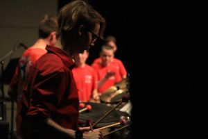 Sophomore percussionist River Smith plays the marimba during “Hannibal’s Revenge. Creeks after-school percussion ensemble gives students opportunities to play independently from concert bands.