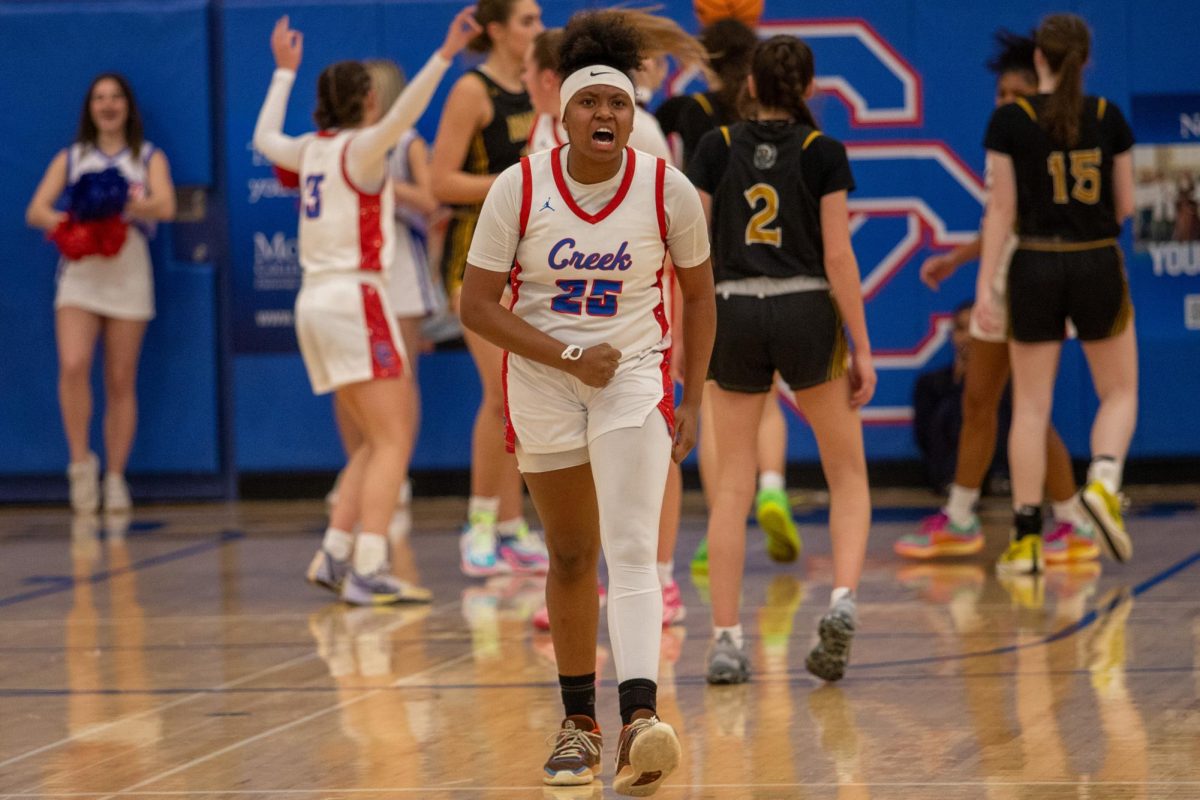 Junior small forward and shooting guard A’neya Chambers (#25) celebrates after a penalty shot  during the Sweet 16 game on Feb. 23, where Creek won 44-28. 