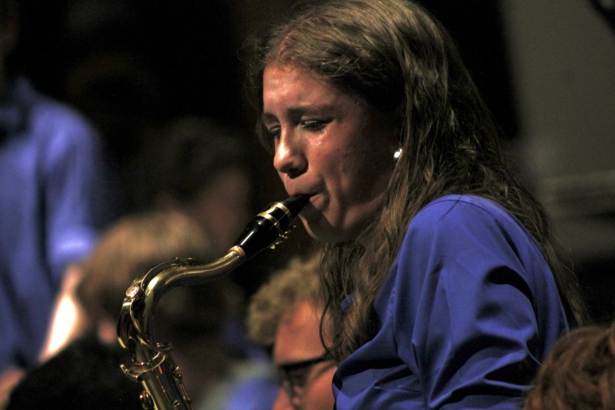 Jazz A tenor saxophone sophomore Sophie Drake grooves to her solo in “Hardly,” the band's first tune of the night. “I was really happy that I incorporated some of the licks that I had worked on,” Drake said. “I felt pretty good. I was definitely feeling it, I was definitely in the zone.”