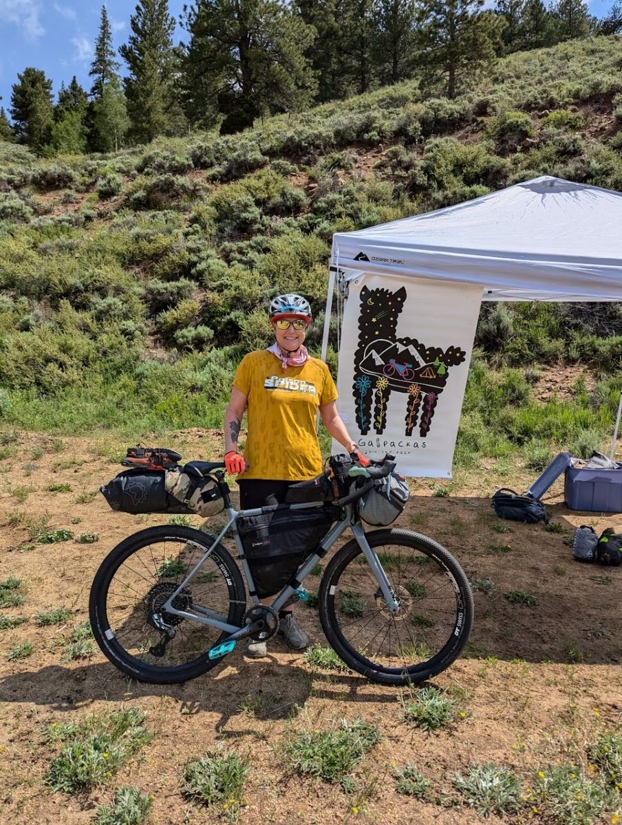 English Teacher Kim Gilbert poses for a photo during her bikepacking trip, where she combined aspects of bike riding and traditional backpacking over the summer