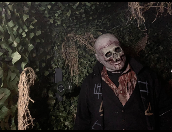 The skull masked man greeting you at the entrance of the Ritual.