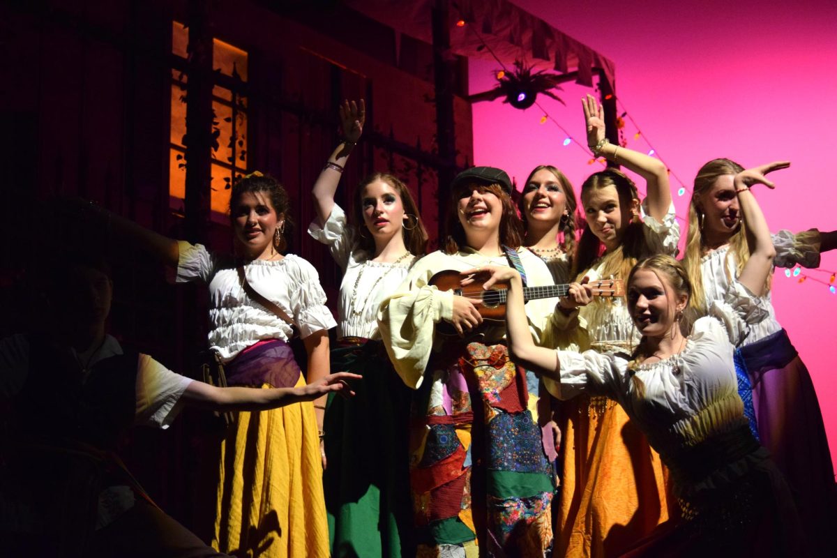 Street performers, headed by senior Mackenzie Norcutt, gather at the end of the show, singing a little tune with a ukulele. The performance of “Twelfth Night” was the theater’s first of the year, and worked to bring in a lot of colorful costumes and sets, and make a Shakespeare play more entertaining for the audience.