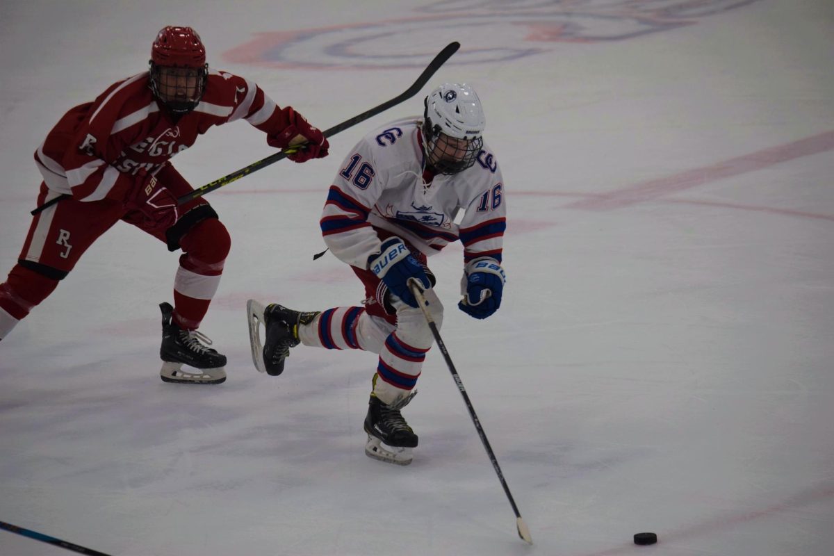 Then junior left-winger Dominic Suchkov (#16) competes against Regis during a 2022-23 season game on Jan. 27. Moving through the next two seasons, the boys' ice hockey team would see a lot of success, completing the 22-23 season with a 12-8-1 record, and the 23-24 season with a 12-5-4.