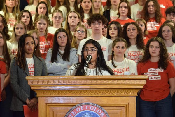 Senior and Creek SDA Co-President Kimaya Kini speaks to a press conference during Advocacy Day at the Colorado State Capitol. During her speech, Kini touched on the importance of protecting people from mass gun violence. “It's a basic common sense [measure] that we can take to stop someone from causing mass harm by shooting as many people as possible and as little time as possible,” she said. 