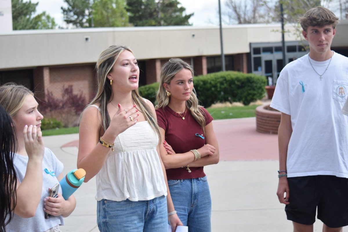 Senior Bruins Consent Coalition board member Giselle Yokomichi expresses gratitude to students after the club's 1.2 mile walk for sexual assault awareness. 
