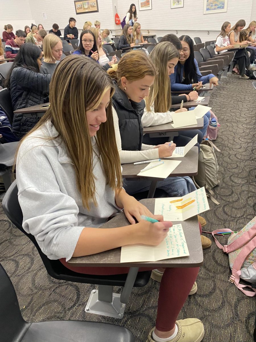 Students in the Sunshine to Seniors club, spreading kindness through visits, handwritten letters, and creating a lasting community with the older generation
