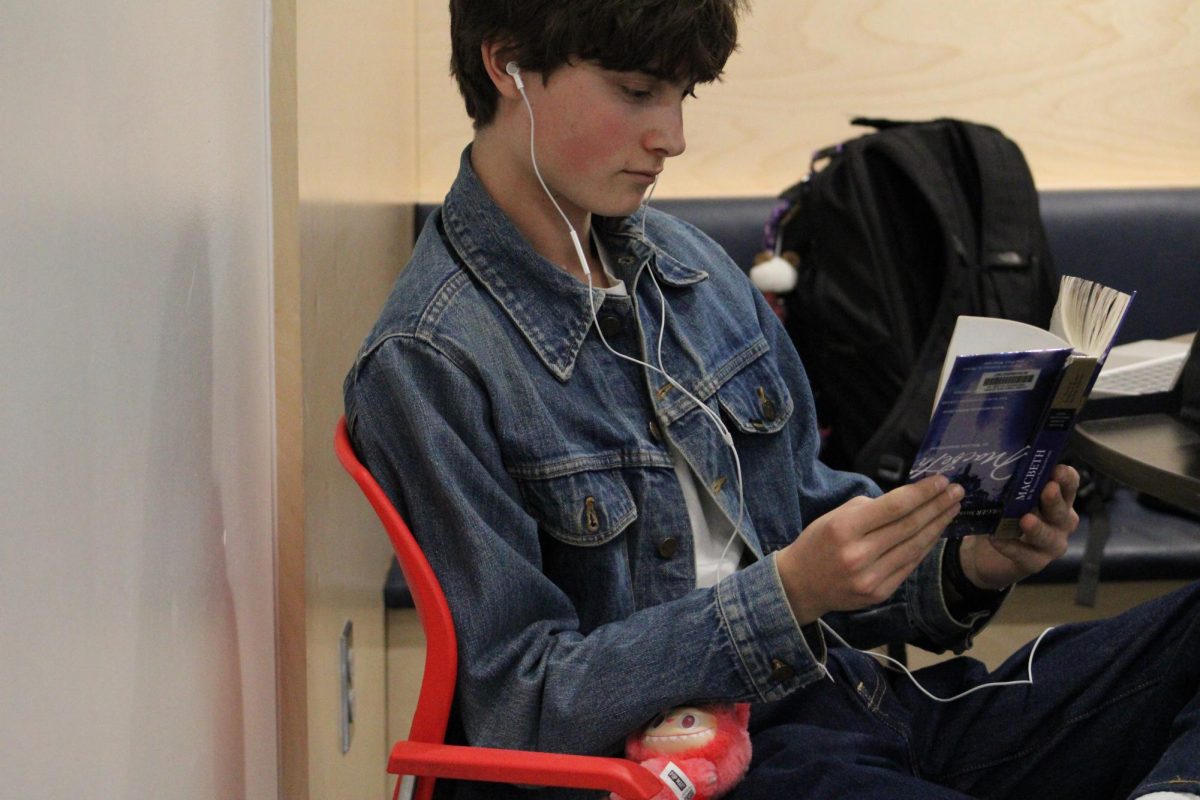 Male manipulators are men who use women's interests against them. Sophomore Ryder Smith poses for a photo with a book upside down in a true performative nature: does he really like the book? Or does he just like the attention?