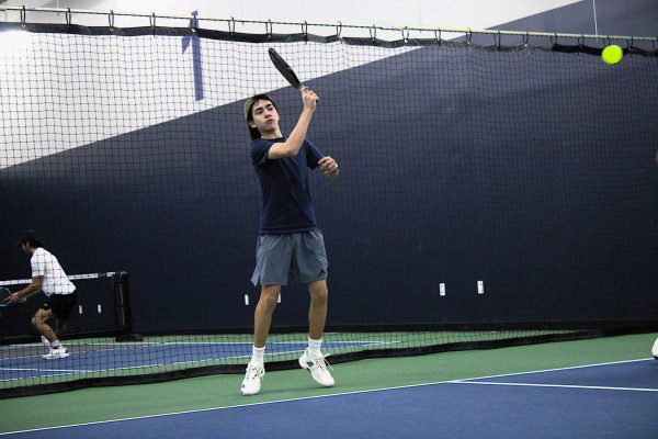 In the midst of an intense match on Jan. 31, sophomore Kaleb Perez plays hard to win at 3rd Shot Pickleball.