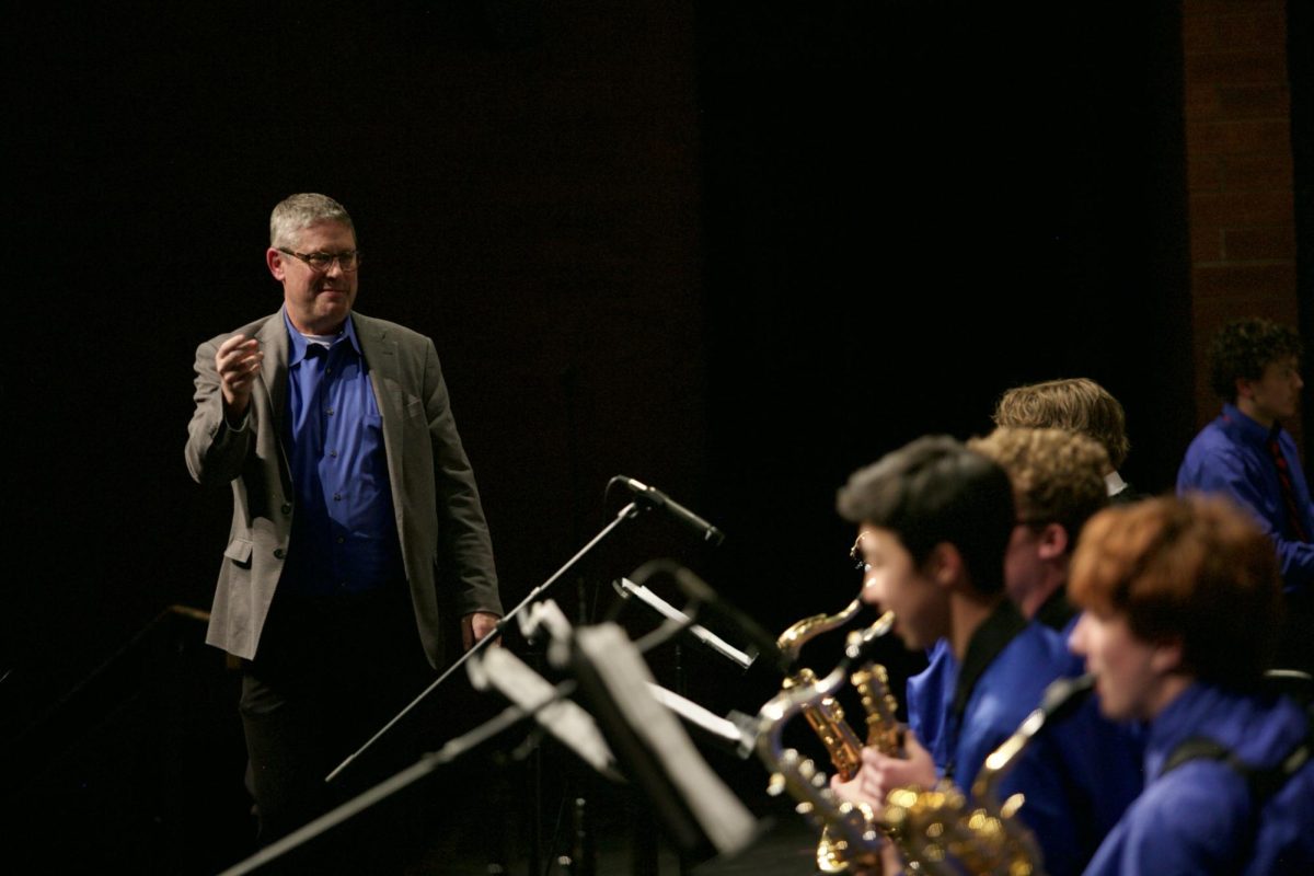 Tim Libby conducts Jazz Band A for their 2025 summer concert.