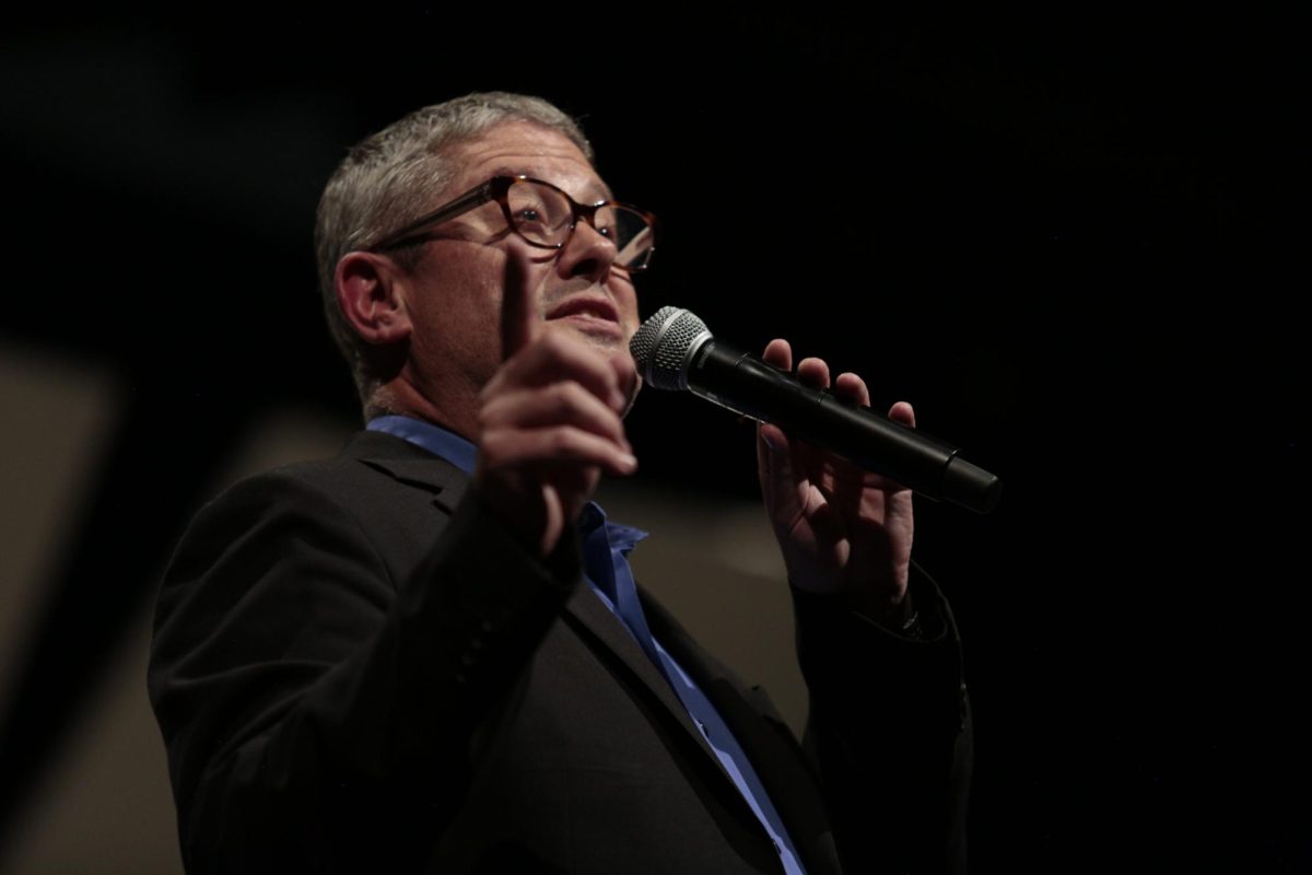 Band director Tim Libby announces at a Sept. 17, 2025 jazz band concert. 